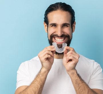 Can a Custom Mouth Guard Reduce Snoring? Ask Your Dentist